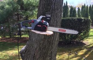 Oregon CS1500 Self-Sharpening 15 Amp Corded Electric Chainsaw, 18 in. Bar, Equipped with PowerSharp Saw Chain Oregon CS1500 Self-Sharpening 15 Amp Corded Electric Chainsaw, 18 in. Bar, Equipped with PowerSharp Saw Chain