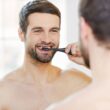 AquaSonic Black Series Ultra Whitening Toothbrush – ADA Accepted Electric Toothbrush - 8 Brush Heads & Travel Case - Ultra Sonic Motor & Wireless Charging - 4 Modes w Smart Timer - Sonic Electric