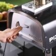 PIZZELLO Outdoor Pizza Oven 12" Propane & Wood Fired Dual Fuel with Gas Burner, Wood Tray, Pizza Stone, Pizza Peel, Carry Bag, Thermometer - Black