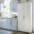 Ameriwood Home Camberly 35.68-in W x 74.31-in H Wood Composite Ivory Oak/Magnolia Oak Freestanding Utility Storage Cabinet