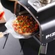 PIZZELLO Pellet Pizza Oven 12" Outdoor Wood Fired Pizza Ovens with Pizza Stone, Pizza Peel, Fold-up Legs, Cover, Thermometer, Chimney - Black