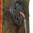John Timberland Rustic Outdoor Wall Water Fountain with Light LED 33" High Medallion for Yard Garden Patio Deck Home Hallway