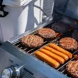 Monument Grills Tabletop Propane Gas Grill Stainless for Portable Camping Cooking with Travel Locks, High Lid