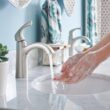 Moen Lindor Transitional Spot Resist Brushed Nickel Single Hole 1-handle WaterSense High-arc Bathroom Sink Faucet with Drain and Deck Plate
