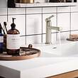 Moen Rinza Modern Straight Spout Spot Resist Brushed Nickel Single Hole 1-handle WaterSense Bathroom Sink Faucet with Drain and Deck Plate