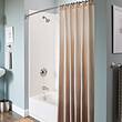 Moen Adler Showerhead, Shower Handle, and Tub Spout, Spot Resist Brushed Nickel 1-handle Multi-function Round Bathtub and Shower Faucet Valve Included