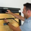 Lifetime 80421 47 in. L x 31 in. D x 60.5 - 71.5 in. H Wall-Mounted Folding Work Table