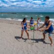 Bottle Bash Outdoor Flying Disc Game Set – Disc Toss Game for Family, Frisbee Target Lawn Game with Poles & Bottles