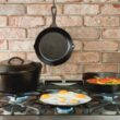 Lodge Seasoned Cast Iron 5 Piece Bundle. 10.5" Griddle, 8" Skillet, 10.25" Skillet, 10.25" Dutch Oven, and 10.25" Lid,Black