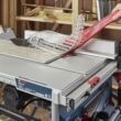 Bosch 10-in 15-Amp 12-Volt Corded Portable Jobsite Table Saw with Foldable Rolling Stand