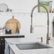 Moen Edwyn Spot Resist Stainless Single Handle Deck-mount Pull-down Kitchen Faucet with Sprayer ( Deck Plate Included ) (Soap Dispenser Included)