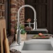 KOHLER Ealing Pre-Rinse Spring Vibrant Stainless Single Handle Deck-mount Pull-down Kitchen Faucet with Sprayer ( Deck Plate Included ) (Soap Dispenser Included)