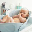 Frida Baby Soft Sink Baby Bath, Sink Bather for Baby, Easy to Clean Baby Bather That Supports Baby's Head