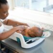 The First Years 4-in-1 Reclining Baby Bathtub - All-in-1 Baby Bath Seat Adjusts as Baby Grows