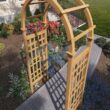 Vita Urban 3.92-ft W x 7.39-ft H Arched Golden Brown Cedar Garden Arbor