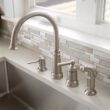 Moen Edison Spot Resist Stainless Single Handle Deck-mount Kitchen Faucet (Soap Dispenser Included) ( Side Sprayer Included )
