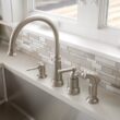 Moen Edison Spot Resist Stainless Single Handle Deck-mount Kitchen Faucet (Soap Dispenser Included) ( Side Sprayer Included )