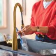 Moen Maureen Brushed Gold Single Handle Deck-mount Pull-down Kitchen Faucet with Sprayer