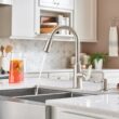Moen Edwyn Spot Resist Stainless Single Handle Deck-mount Pull-down Kitchen Faucet with Sprayer ( Deck Plate Included ) (Soap Dispenser Included)
