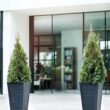 Keter Set of 2 Resin Modern Outdoor 22 Inch Tall Large Flower Pots, Tapered Wood Look Planters, Graphite