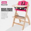 Abiie Beyond Junior Wooden High Chair with Tray - Adjustable and Convertible High Chair for Babies and Toddlers - 6 Months to 250 Lb - Water Resistant - Natural Wood/Raspberry Cushion