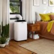AIRO COMFORT 14,000 BTU Portable Air Conditioner Cools 700 Sq. Ft. with Dehumidifier and LCD Remote in White