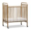 NAMESAKE Abigail 3-in-1 Portable Baby Crib with Wheels - Metal Baby Bed w/ 4 Adjustable Mattress Heights, for Small Spaces - Gold