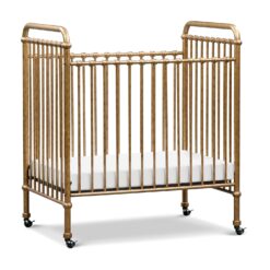 NAMESAKE Abigail 3-in-1 Portable Baby Crib with Wheels - Metal Baby Bed w/ 4 Adjustable Mattress Heights, for Small Spaces - Gold