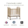 NAMESAKE Abigail 3-in-1 Portable Baby Crib with Wheels - Metal Baby Bed w/ 4 Adjustable Mattress Heights, for Small Spaces - Gold NAMESAKE Abigail 3-in-1 Portable Baby Crib with Wheels - GREENGUARD Gold Certified Convertible Crib to Toddler Bed & Daybed - Metal Baby Bed w/ 4 Adjustable Mattress Heights, for Small Spaces - Gold