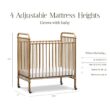 NAMESAKE Abigail 3-in-1 Portable Baby Crib with Wheels - Metal Baby Bed w/ 4 Adjustable Mattress Heights, for Small Spaces - Gold NAMESAKE Abigail 3-in-1 Portable Baby Crib with Wheels - GREENGUARD Gold Certified Convertible Crib to Toddler Bed & Daybed - Metal Baby Bed w/ 4 Adjustable Mattress Heights, for Small Spaces - Gold