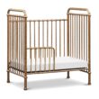 NAMESAKE Abigail 3-in-1 Portable Baby Crib with Wheels - Metal Baby Bed w/ 4 Adjustable Mattress Heights, for Small Spaces - Gold NAMESAKE Abigail 3-in-1 Portable Baby Crib with Wheels - GREENGUARD Gold Certified Convertible Crib to Toddler Bed & Daybed - Metal Baby Bed w/ 4 Adjustable Mattress Heights, for Small Spaces - Gold