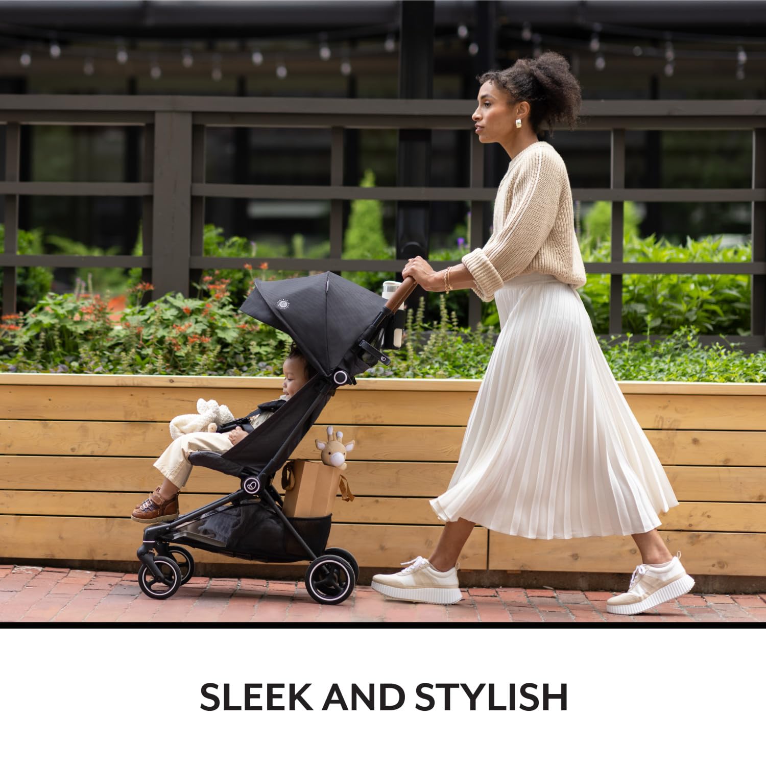 Evenflo Hummingbird Ultra-Lightweight Carbon Fiber Stroller (Calypte Pink) Evenflo Hummingbird Ultra-Lightweight Carbon Fiber Stroller (Calypte Pink)