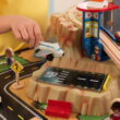 KidKraft Metropolis Wooden Train Set and Train Table with 100 Accessories