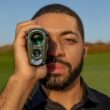 Bushnell Golf Pro X3+ Laser Rangefinder with Wind Speed, Slope & Elements Compensation | 1300-Yard Range, 7x Magnification, Dual Display, Visual JOLT & Magnetic Cart Mount