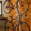 Saris The Hottie Two Bike Home Storage Stand – Freestanding, Stylish Bike Rack – Holds 2 Bikes up to 35 lbs Each Saris The Hottie Two Bike Home Storage Stand – Freestanding, Stylish Bike Rack – Holds 2 Bikes up to 35 lbs Each – Adjustable Cradles – Built-in Accessories Shelf – No Drilling or Mounting Required