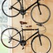 Saris The Hottie Two Bike Home Storage Stand – Freestanding, Stylish Bike Rack – Holds 2 Bikes up to 35 lbs Each Saris The Hottie Two Bike Home Storage Stand – Freestanding, Stylish Bike Rack – Holds 2 Bikes up to 35 lbs Each – Adjustable Cradles – Built-in Accessories Shelf – No Drilling or Mounting Required