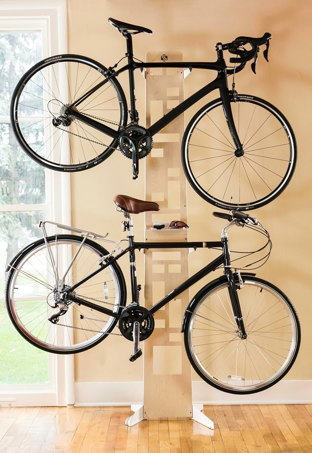 Saris The Hottie Two Bike Home Storage Stand – Freestanding, Stylish Bike Rack – Holds 2 Bikes up to 35 lbs Each Saris The Hottie Two Bike Home Storage Stand – Freestanding, Stylish Bike Rack – Holds 2 Bikes up to 35 lbs Each – Adjustable Cradles – Built-in Accessories Shelf – No Drilling or Mounting Required