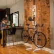 Saris The Hottie Two Bike Home Storage Stand – Freestanding, Stylish Bike Rack – Holds 2 Bikes up to 35 lbs Each Saris The Hottie Two Bike Home Storage Stand – Freestanding, Stylish Bike Rack – Holds 2 Bikes up to 35 lbs Each – Adjustable Cradles – Built-in Accessories Shelf – No Drilling or Mounting Required