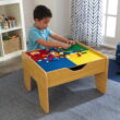 KidKraft Reversible Wooden Activity Table with Board and Train Set, Natural, for Ages 3+ Years