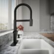 KOHLER Koi Pre-Rinse Spring Matte Black Single Handle Deck-mount Pull-down Kitchen Faucet with Sprayer (Includes Deck Plate) (Includes Soap Dispenser)