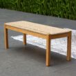Cambridge Casual Carmel 47-in W x 17-in H Natural Teak Wicker Teak Dining Bench Cambridge Casual Carmel 47-in W x 17-in H Natural Teak Wicker Teak Dining Bench