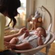 Maxi-Cosi Cassia Smart Baby Swing for Infants, Portable Foldable Swing with Music, 360 Rotation, 5 Speeds, 12 Melodies, EcoCare Fabric, Auto Motion Sensor, 2 Reclines, Classic Graphite