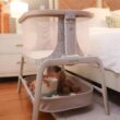 Maxi-Cosi Iora Baby Bassinets Bedside Sleeper, Portable Bassinet, Infant Bedside Sleeper Crib, Height Adjustable, Breathable Mesh, Large Storage Basket, Classic Graphite