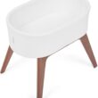 Delta Children Aero Bassinet - Portable Baby Crib with Solid Wood Legs, Organic GOTS Certified Performance Fabric Exterior, Breathable Interior, Includes Mattress Pad & Fitted Sheet, White
