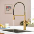 Moen Joric Brushed Gold Single Handle Deck-mount Pull-down Kitchen Faucet with Sprayer (Includes Deck Plate) Moen Joric Brushed Gold Single Handle Deck-mount Pull-down Kitchen Faucet with Sprayer (Includes Deck Plate)