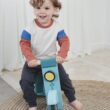 Tender Leaf Toys - Delivery Scooter - Wooden Ride-On Toy for Toddlers with Rubber Trimmed Wheels - Role-Play Scooter with Canvas Bag - Develop Social, Language and Gross Motor Skills - Age 2+