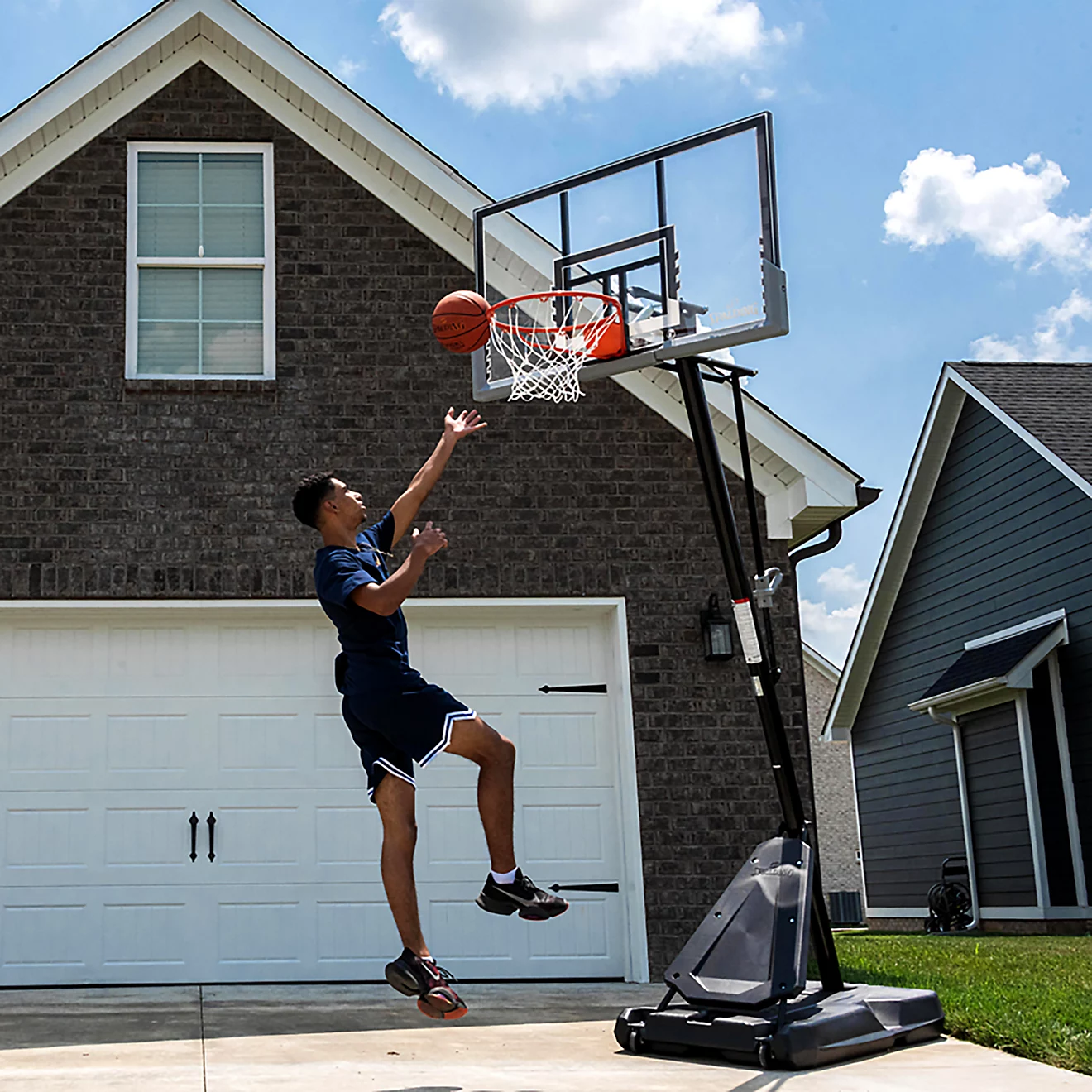 Spalding 54 in Angled Portable Pro Glide Basketball Hoop Spalding 54 in Angled Portable Pro Glide Basketball Hoop - Image 7