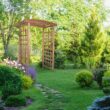 All Things Cedar 5.92-ft W x 7.25-ft H Arched Natural Wood Cedar Garden Arbor
