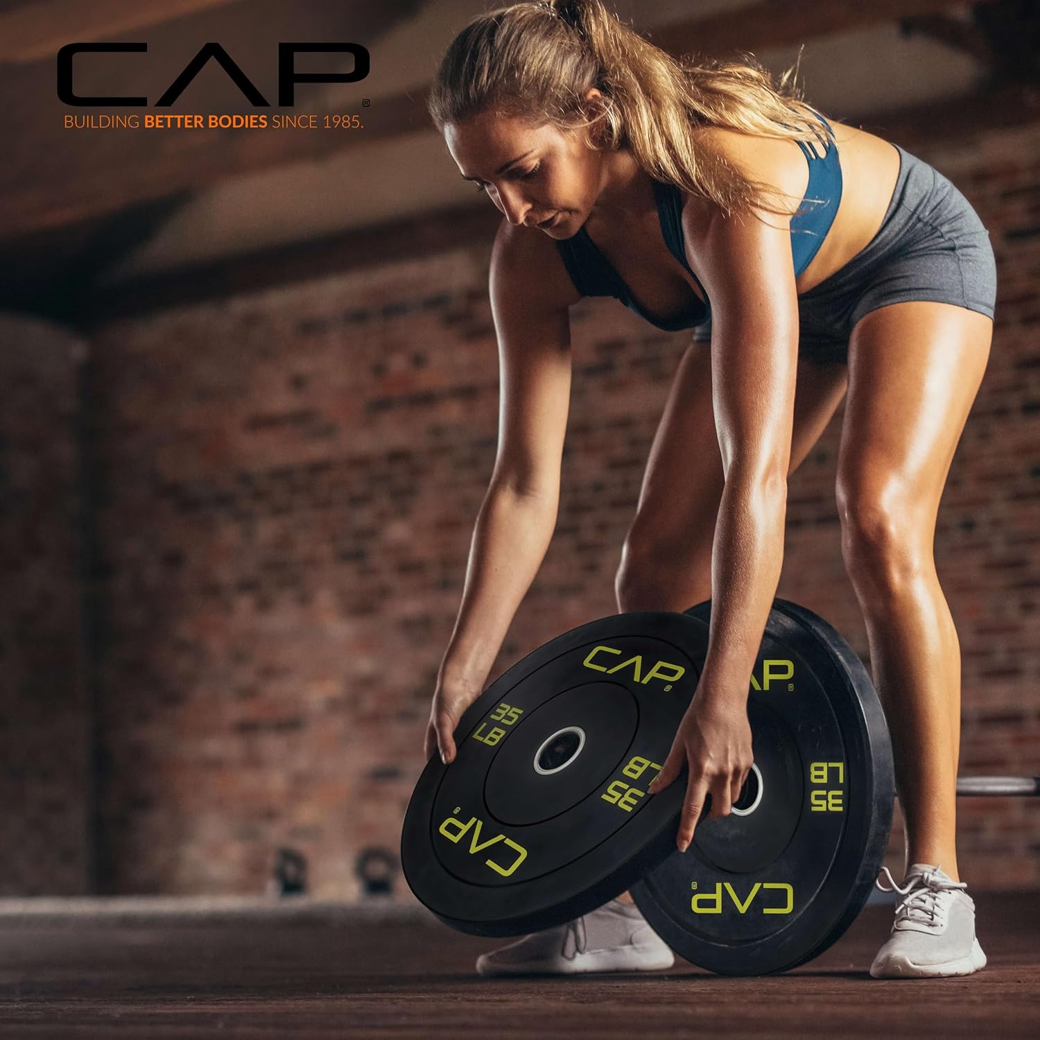CAP 2-inch Olympic Bumper Plate Weight Set | 190 lbs | Multiple Colors | Storage Rack Optional CAP 2-inch Olympic Bumper Plate Weight Set | 100-370 lbs | Multiple Colors | Storage Rack Optional
